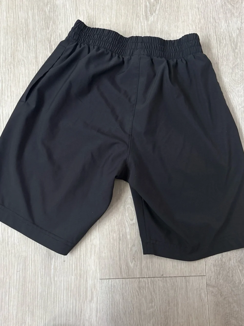 Nike gray polo shirt paired with black shorts - Picture 6 of 8